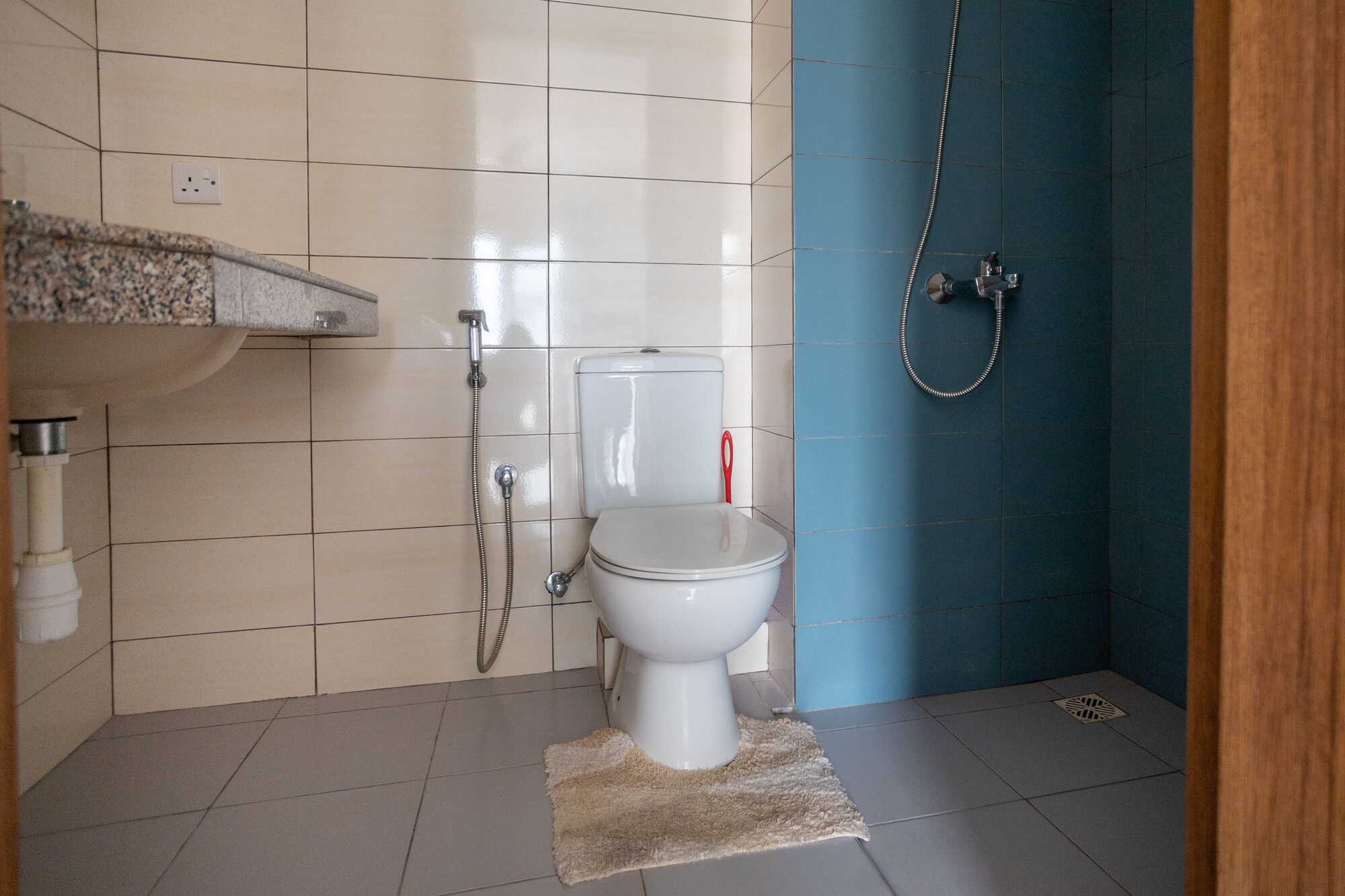 Stone washbasin in the apartment bathroom